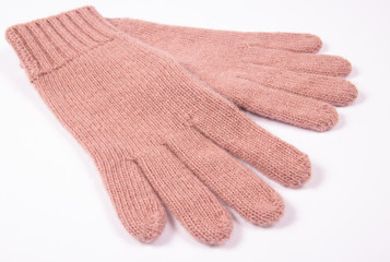 Winter, woolen gloves on a white background.