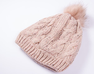 Fototapeta na wymiar Wool hat for winter weather on a white background.