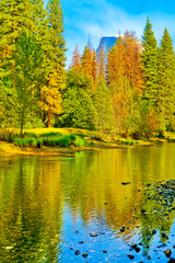 View of Half Dome and Merced River from Yosemite Valley in Yosemite National Park in autumn.