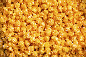 golden cheese popcorn food background