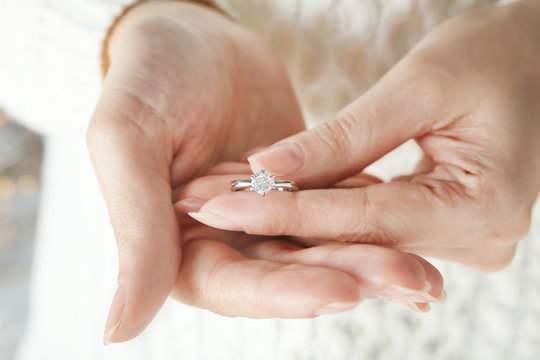 Woman Holding Luxury Engagement Ring, Closeup