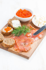 salted salmon, red caviar, toast and butter, vertical