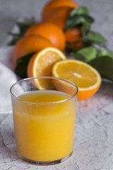 Fresh orange juice in glass cup