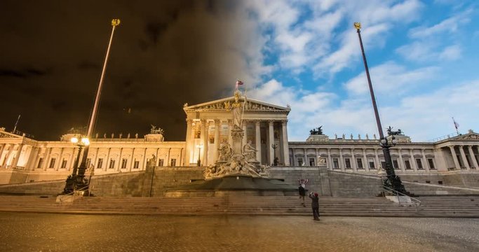 VIENNA, AUSTRIA &ndash; DECEMBER 2015 : Timelapse of Vienna Parliament Day / Night edited in one shot with people in view