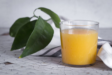 Fresh orange juice in glass cup