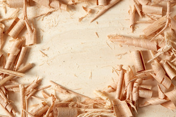 DIY concept. Woodworking and crafts. Chisel. plane and stock on the workbench. Top view. Wooden background.