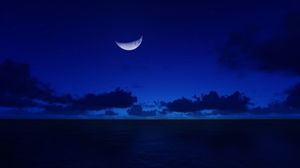 a crescent moon in the night ocean