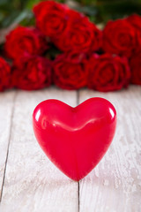 Fototapeta na wymiar Hearts on old wood. Background Valentines Day