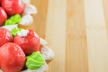 Cake in the form of a flower in a crust basket. Dessert.