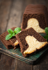 Homemade marble pound cake on a wooden board