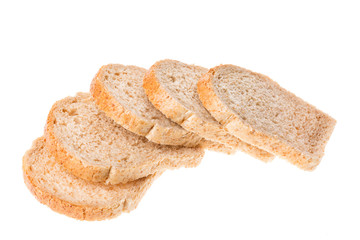 Tasty sliced fresh bread pieces isolated on white background.