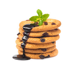 sweet cookies with raisin pouring chocolate sauce
