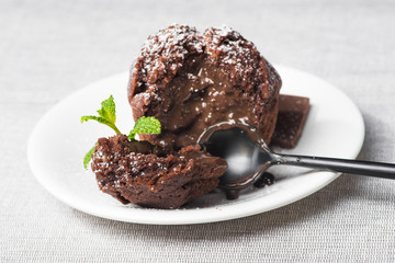 Sweet muffin cake with melted chocolate