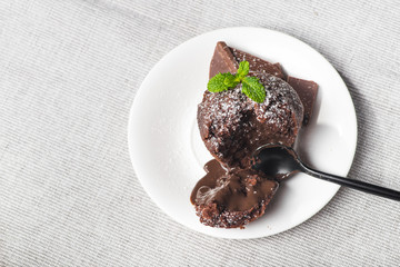 Sweet muffin cake with melted chocolate