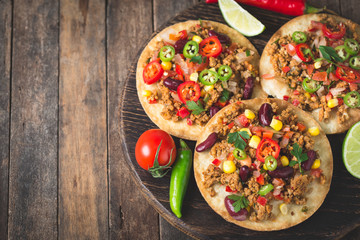 Mexican tacos with beef, vegetables and spices