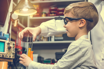 Physics experiment with magnet and work tools.