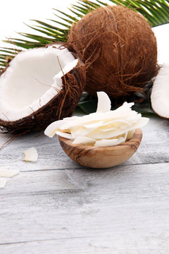 Heap of Grated Coconut on wooden background. coconut flakes concept