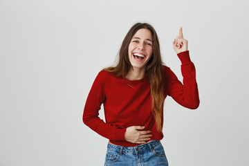LMAO. LOL. Copy space. Close up of young joyful attractive european girl with long hair in casual...