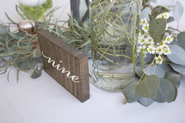 Wedding Decorations for a Rustic Reception with Flowers, Lanterns and Candles