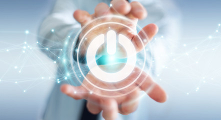 Businessman using 3D render power button with connections