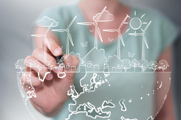 Businesswoman drawing renewable energy sketch