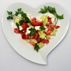 Heart shaped plate and vegetables