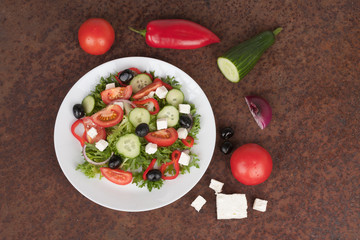 Traditional greek sallad on white plate