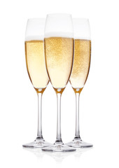 Elegant glasses of yellow champagne with bubbles