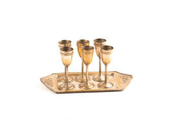 Set of six bronze glasses with a beverage tray