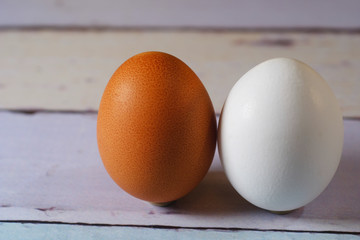 Two eggs of different colours