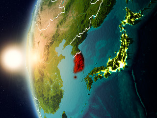 Sunset above South Korea from space