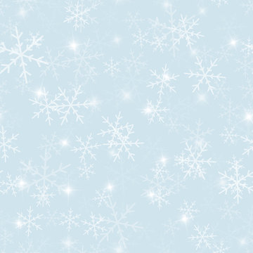 Magic snowflakes seamless pattern on light blue Christmas background. Chaotic scattered magic snowflakes. Ravishing Christmas creative pattern. Vector illustration.