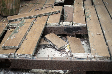 Ruins Cracked wooden floor and iron steel with rust