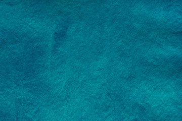 blue watercolor painted on paper background texture