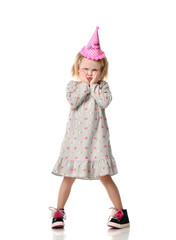 Obraz na płótnie Canvas Young blond girl in birthday party princess hat upset sad emotions isolated 