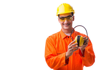 Construction worker with noise cancelling earphones