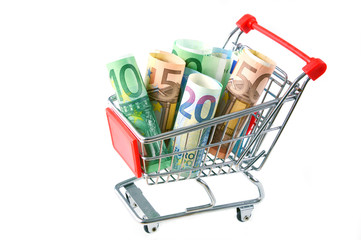 Euro banknotes rolled in supermarket Cart with white background