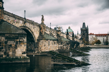 Fototapeta na wymiar King Charles bridge in Prague on rainy day