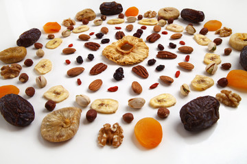 mandala of dried fruits and nuts - symbols of jewish holiday Tu Bishvat