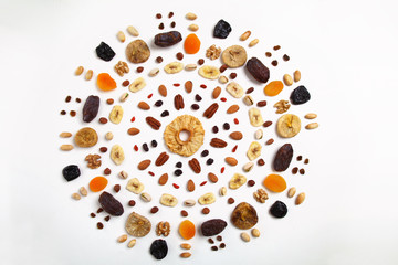 mandala of dried fruits and nuts - symbols of jewish holiday Tu Bishvat - obrazy, fototapety, plakaty
