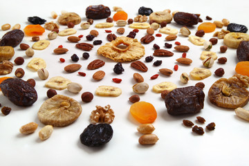 mandala of dried fruits and nuts - symbols of jewish holiday Tu Bishvat