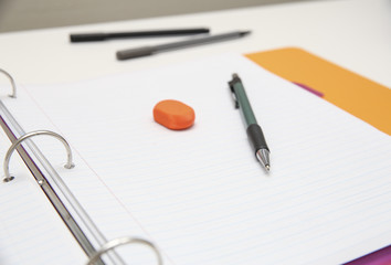 Student homework, white desk 