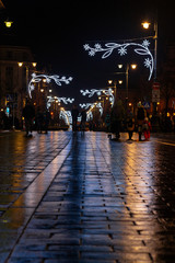 Vilnius, Lithuania - January 1, 2018: Gediminas avenue - the main street of Lithuanian capital city (Vilnius) is decorated for Chrismass and New Year celebration.