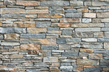 piled stone wall - Powered by Adobe