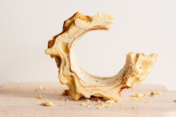 Shakotis - the national Lithuanian baking, close up. The pie which can be put on the hand like a bracelet.