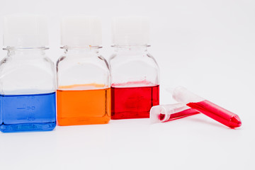 Chemical tubes and flasks with colorful liquids and reagents. Medical laboratory research. drug discovery, pharmacology and biotechnology concept. science and research background with copy space.