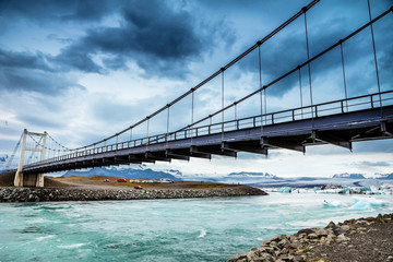  Bridge and picturesque Icelandic landscape.