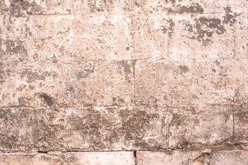 Ancient collapsing brick wall, vintage grunge background, texture