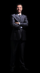 Obraz na płótnie Canvas Close up portrait of a business man on black background