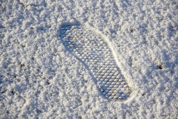 shoe boots footprints in the snow
